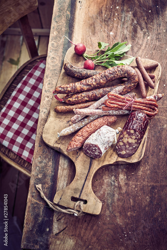 Variety of different wild venison dried sausages photo