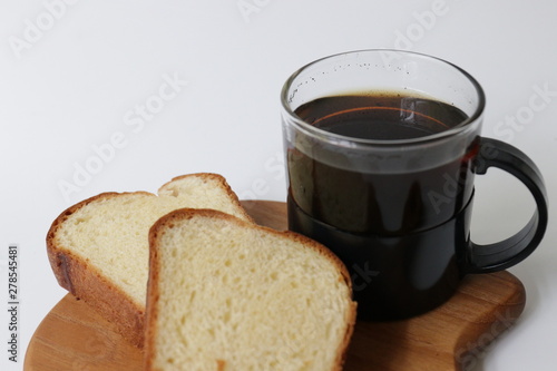 Close up Brioche with Black Coffee On White background