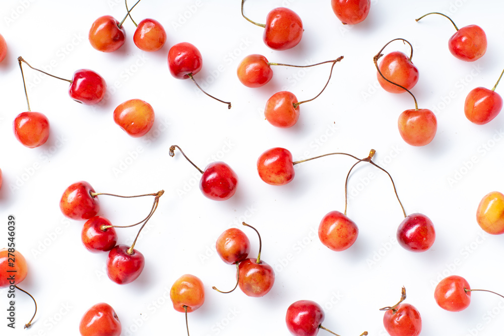 Top view image of fresh ripe red cherries isolated on white background Top view image of fresh ripe red cherries isolated on white background