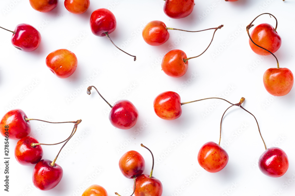 Top view image of fresh ripe red cherries isolated on white background Top view image of fresh ripe red cherries isolated on white background