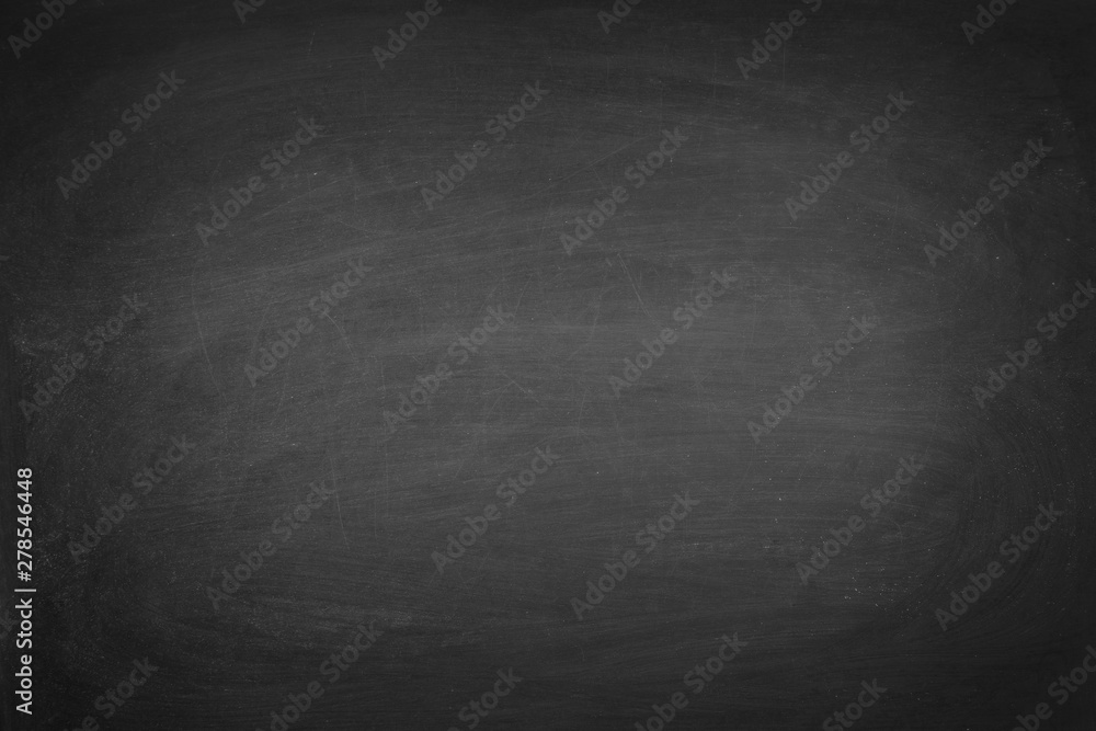 Fototapeta premium Working place on empty rubbed out on blackboard chalkboard texture background with colorful crayons chalk for classroom or wallpaper, add text message.