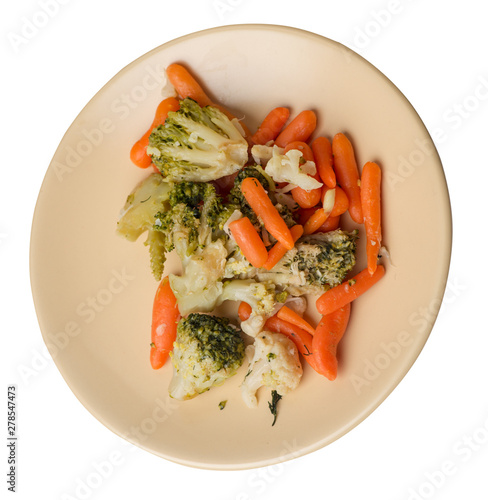 provencal vegetables on a plate.grilled vegetables on a plate isolated on white background.broccoli and carrots on a plate top view.healthy  food