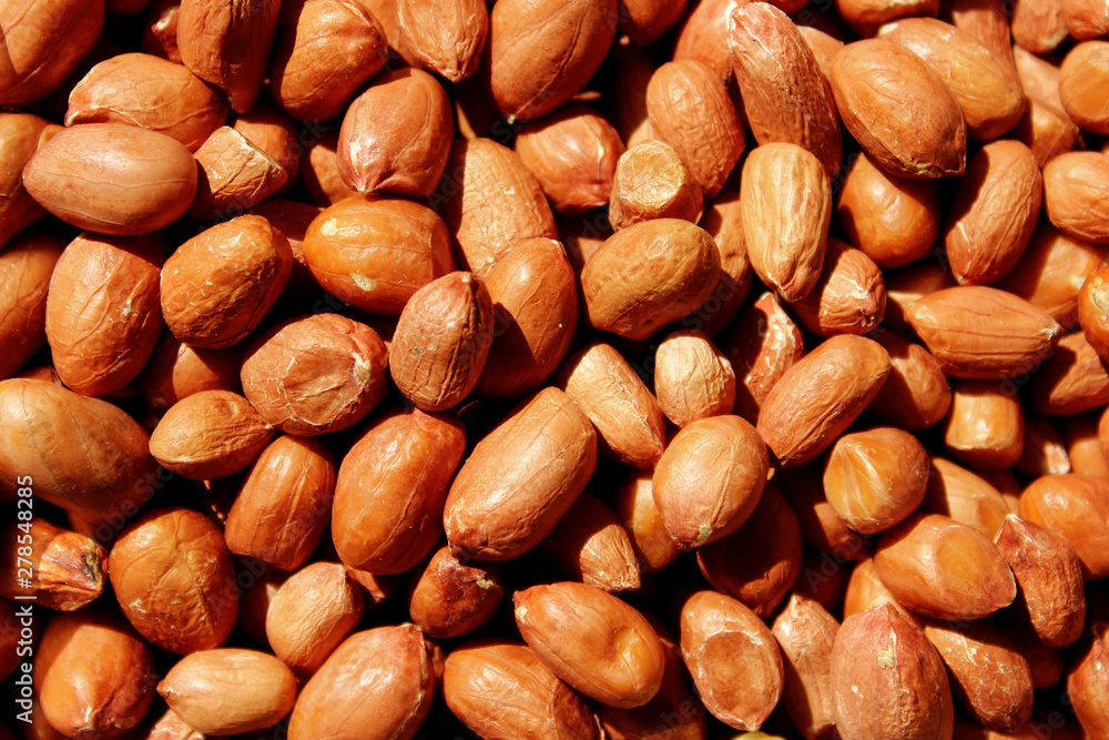 Peanuts background. Cropped shot of peanuts. Healthy food background. Peanuts background. Cropped shot of peanuts. Healthy food background.