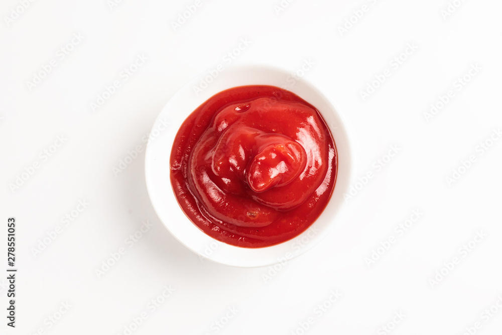 Ketchup in white plate on white background. Ketchup in white plate on white background.