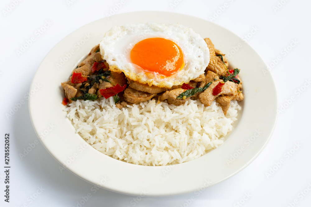 Rice topped with stir-fried chicken and holy basil, fried egg