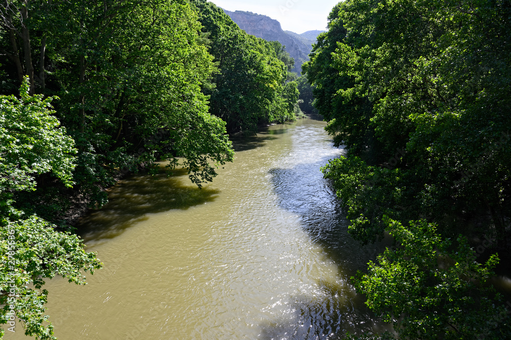 View of the Pineios river and the famous Vale of Tempe, a gorge in the Tempi municipality of northern Thessaly, Greece View of the Pineios river and the famous Vale of Tempe, a gorge in the Tempi municipality of northern Thessaly, Greece