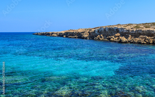 Azure Lagoon on the island of Cyprus. Mediterranean coastline. Background. Copy space.
