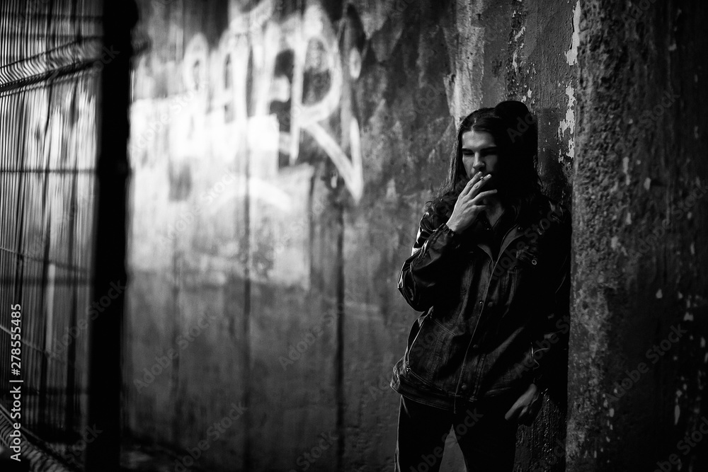 young musician with long hair young musician with long hair