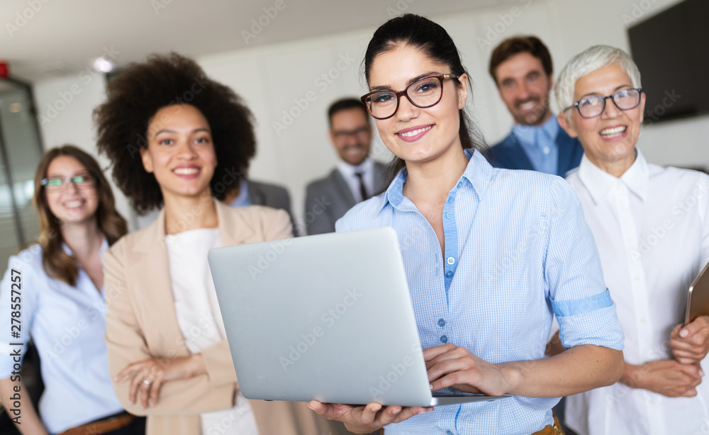 Group of successful business people at work in office Group of successful business people at work in office