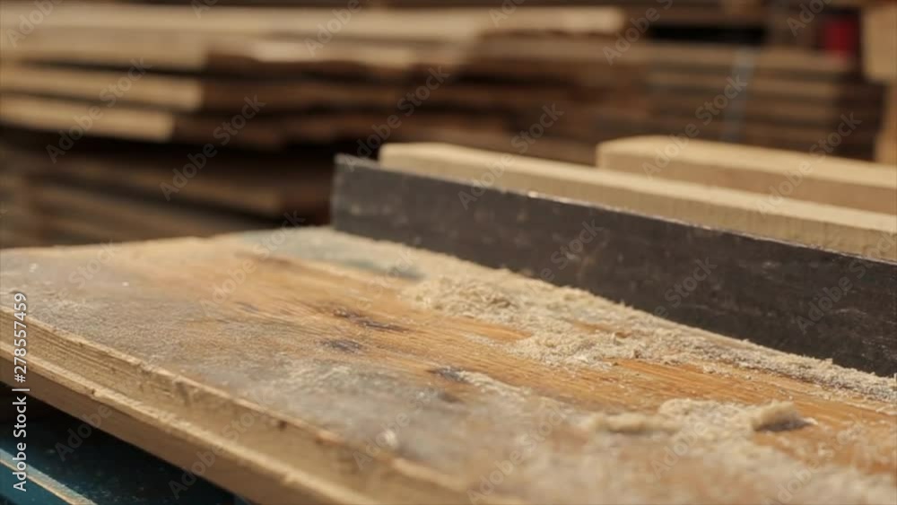 Construction glasses goggles. sawdust around. Sawmill. Wood harvesting concept. Slow motion. Construction glasses goggles. sawdust around. Sawmill. Wood harvesting concept. Slow motion.