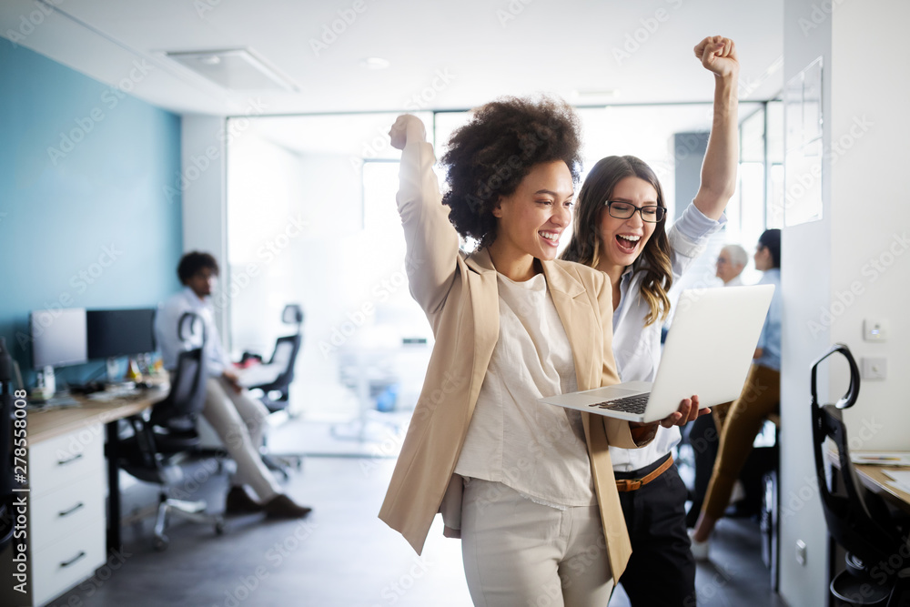 Successful business group of people at work in office Successful business group of people at work in office