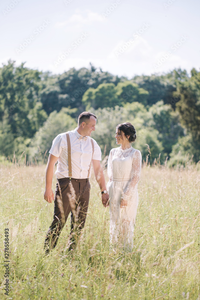 Portrait of a couple in the meadow
