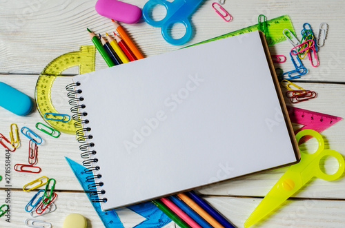 School and office supplies on a wooden