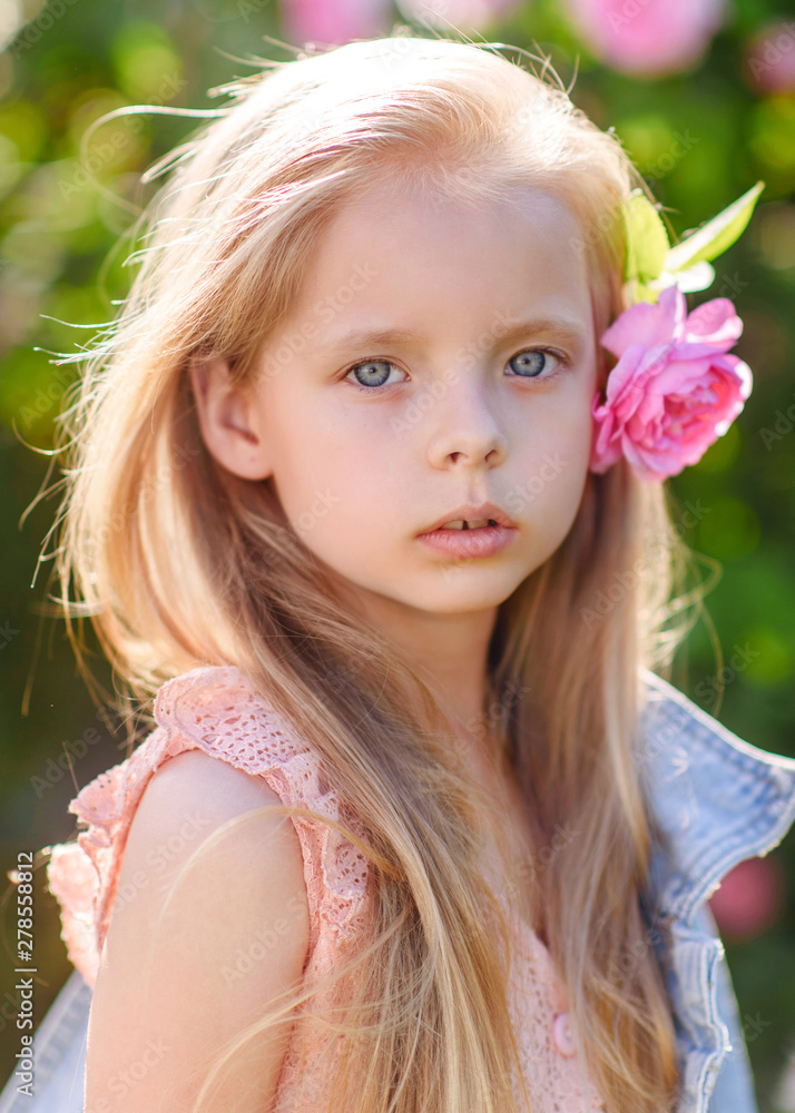portrait of little girl outdoors in summer portrait of little girl outdoors in summer