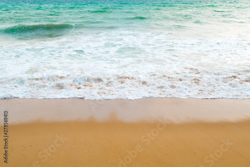 Beautiful beach ocean wave with blue color water of the sea background in daytime
