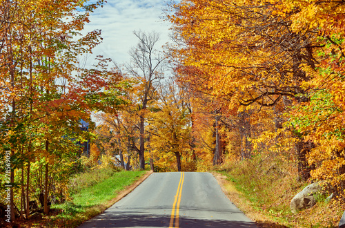 Highway at autumn day in Vermont, USA.