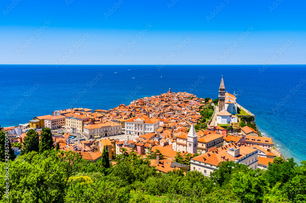 Iconic aerial view of harbor fishing town of Piran, Slovenia on the Adriatic Sea riviera in the Mediterraniean Sea