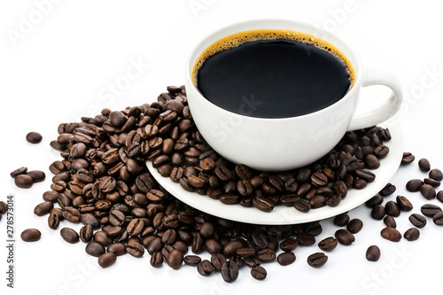 Black coffee in a white coffee cup and coffee beans on a white background