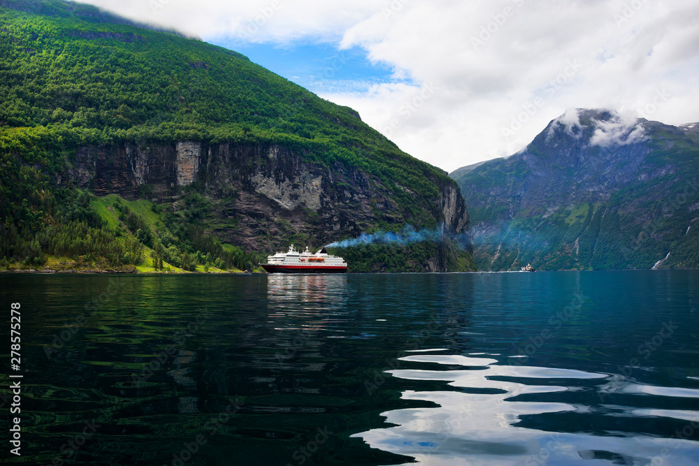 Beautiful landscape and ferry cruise at Geirangerfjord , stunning natural masterpiece included in UNESCO World Heritage , Sunnmore region, Norway