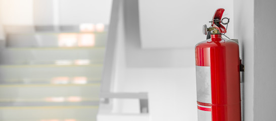 Fire extinguisher system on the wall background, powerful emergency equipment for industrial