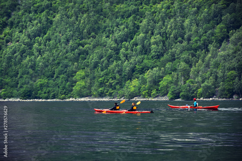 Adventure with kayak at Geirangerfjord , stunning natural masterpiece included in UNESCO World Heritage , Sunnmore region, Norway