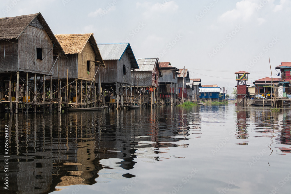 Traditional Burmese floating house on water in Inle lake, Myanmar