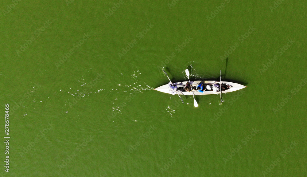 Kayaking top view. Kayak rowing. Aerial view from drone. Kayaking top view. Kayak rowing. Aerial view from drone.