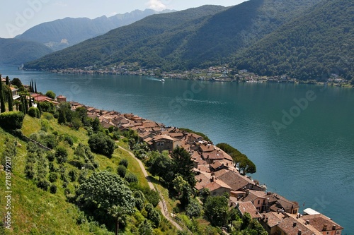 Panoramatic view of a village on a shore of a beautiful mountain lake