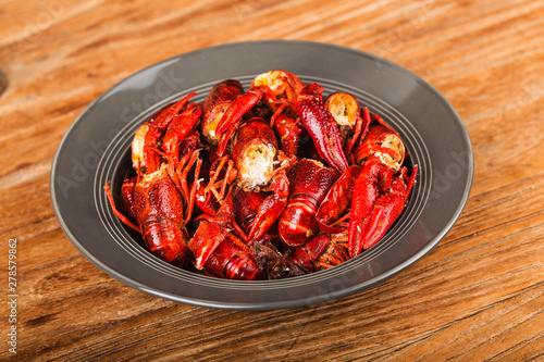 Crayfish. Red boiled crawfishes on table in rustic style, Lobster closeup.
