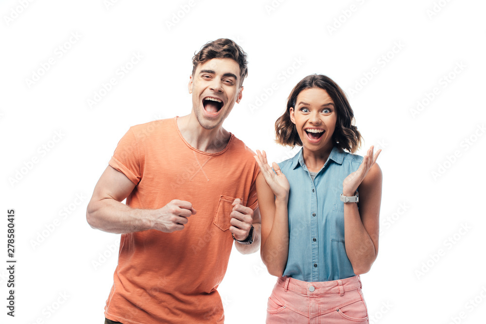 excited man and woman smiling at camera and showing yes gestures isolated on white excited man and woman smiling at camera and showing yes gestures isolated on white