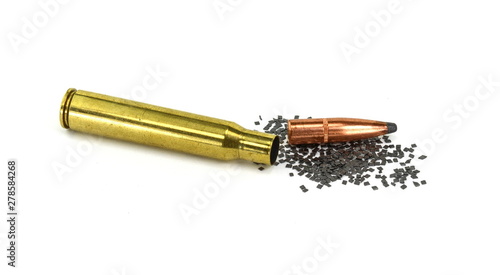 A rifle bullet, empty shell on white background. Hunting ammunition isolated on white.