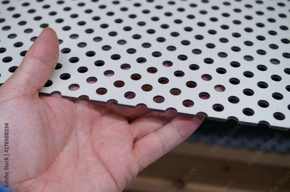 Board with holes for DIY Stock Photo Adobe Stock