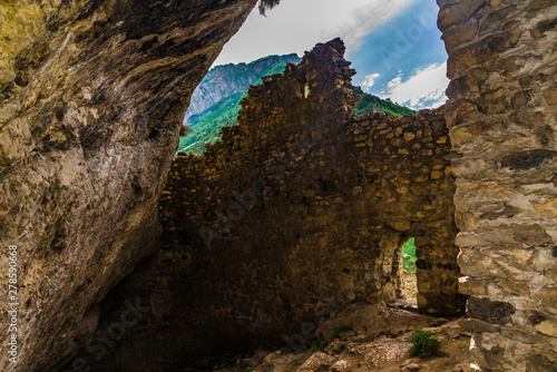 Medieval rock fortress in North Ossetia Alania photo
