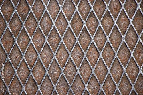 Rusted brown metal pattern grit surface texture