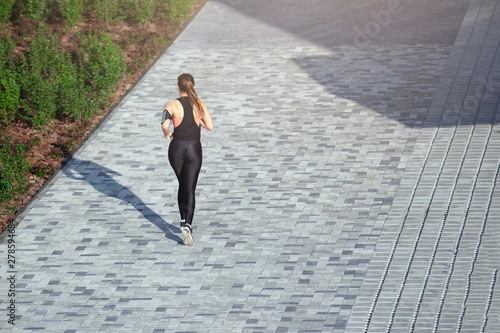 woman running in the city
