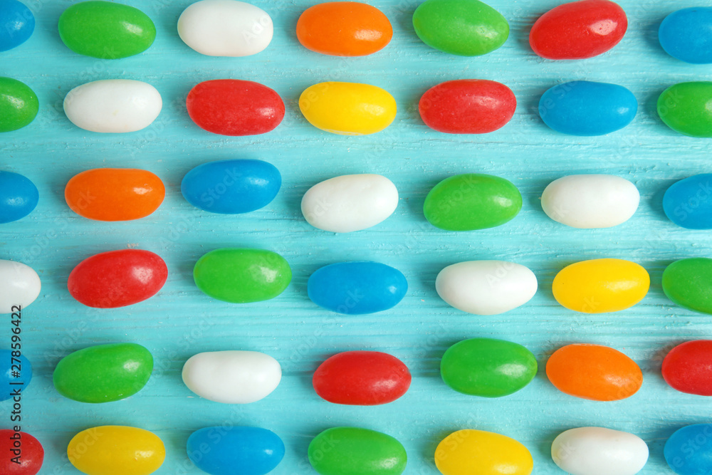 Flat lay composition with jelly beans on color background Flat lay composition with jelly beans on color background