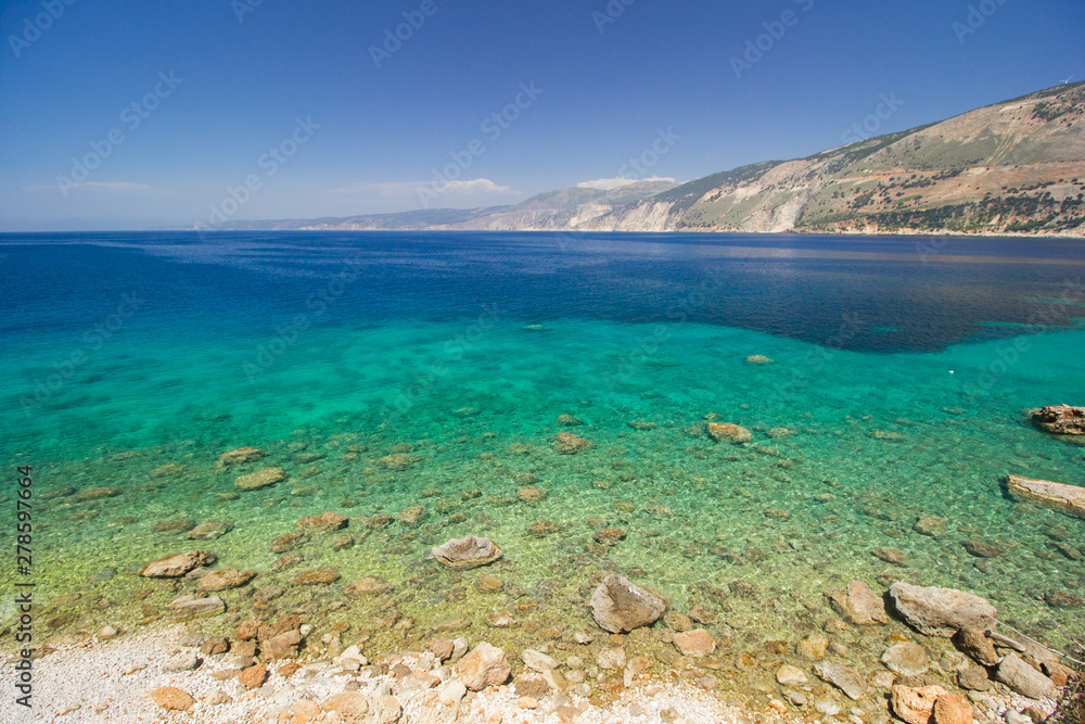 Vouti beach, Kefalonia island, Greece. People relaxing at the beach. 