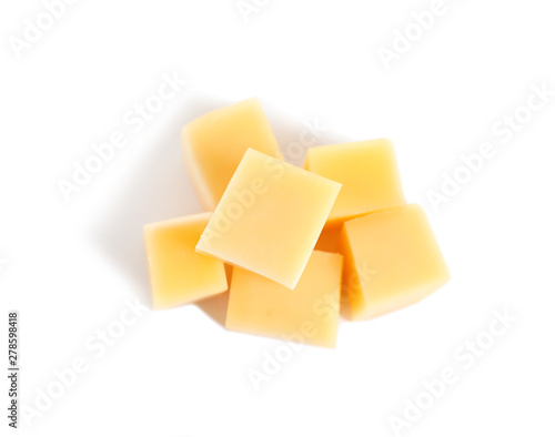 Cut fresh delicious cheese isolated on white