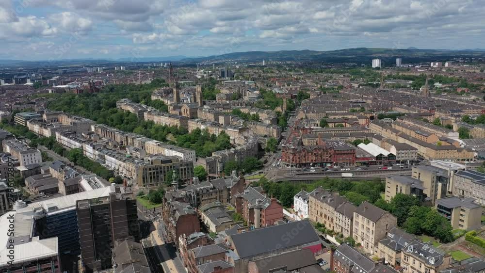 Aerial view of cityscape of Glasgow, largest city in Scotland, mixture of modern and historic buildings - landscape panorama of Great Britain from above, United Kingdom, Europe Aerial view of cityscape of Glasgow, largest city in Scotland, mixture of modern and historic buildings - landscape panorama of Great Britain from above, United Kingdom, Europe