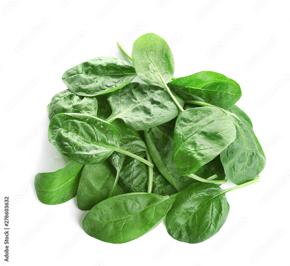 Heap of fresh green healthy baby spinach leaves isolated on white, top view Heap of fresh green healthy baby spinach leaves isolated on white, top view