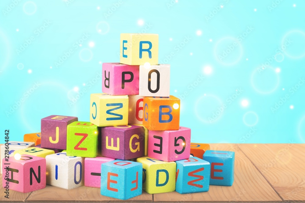 Colorful cubes on background. Educational concept. Colorful cubes on background. Educational concept.
