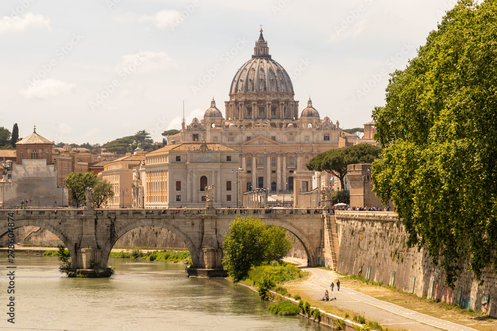 View of the Vatican, St. Peter's Basilica, St. angel bridge over the Tiber river. Rome, Italy.
