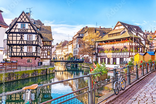 Traditional half-timbered houses on picturesque canals in La Petite France in the medieval fairytale town of Strasbourg, UNESCO World Heritage Site, Alsace, France.