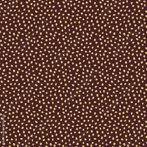 Seamless vector background with random golden elements. Abstract ornament. Dotted abstract pattern