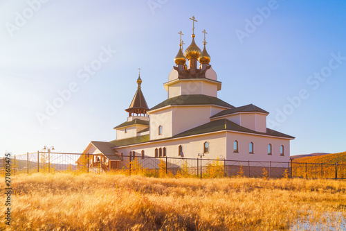 Russian Orthodox Church of St. Seraphim of Sarov in the city of Bilibino. Chukotka, Siberia, Far East of Russia. Autumn season. photo