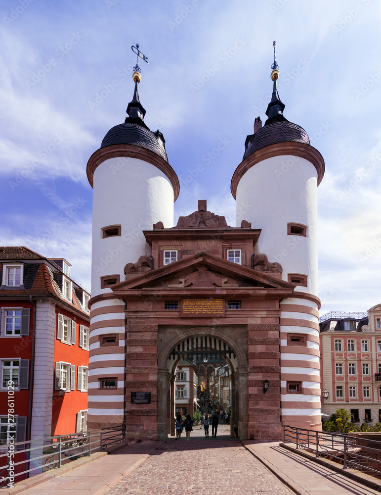 Obraz premium The historical old bridge gate with two towers in Heidelberg , Baden Wuerttemberg, Germany, Europe