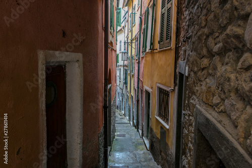 Claustrophobic street in empty village © Simone