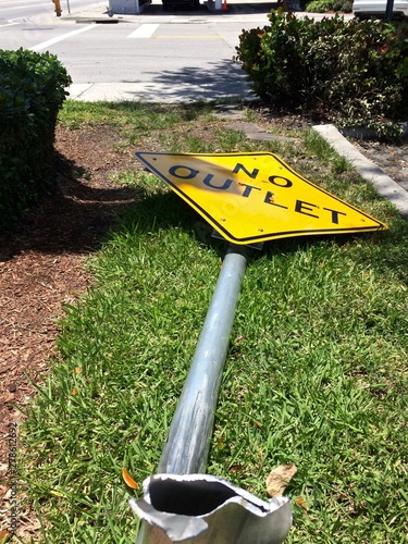 Street sign on ground