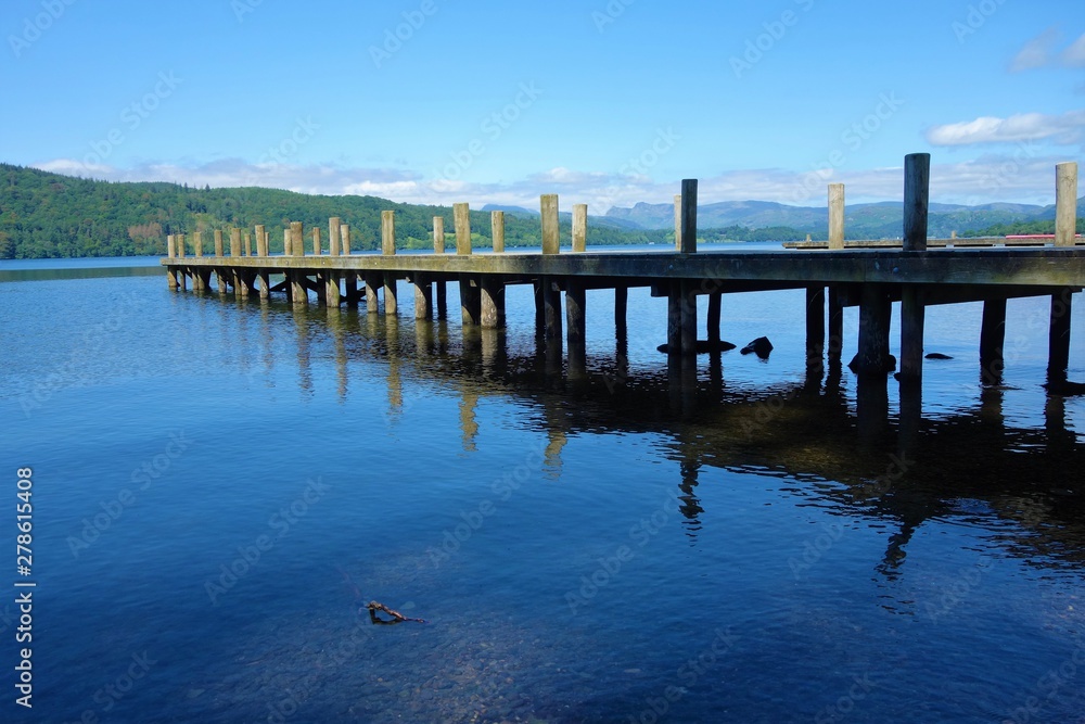 A wooden pier on Lake Windermere.