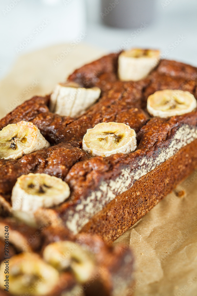 Homemade sliced banana bread on a white background. Homemade sliced banana bread on a white background.